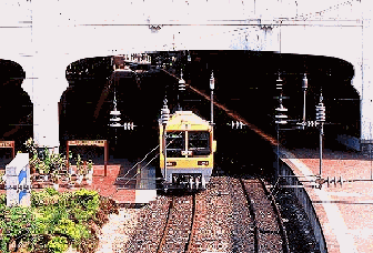 A commuter train waiting at the station 